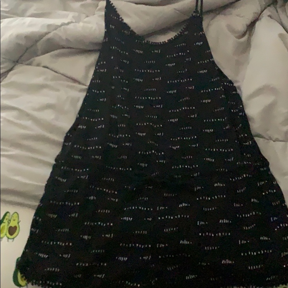 L black patterned romper never worn